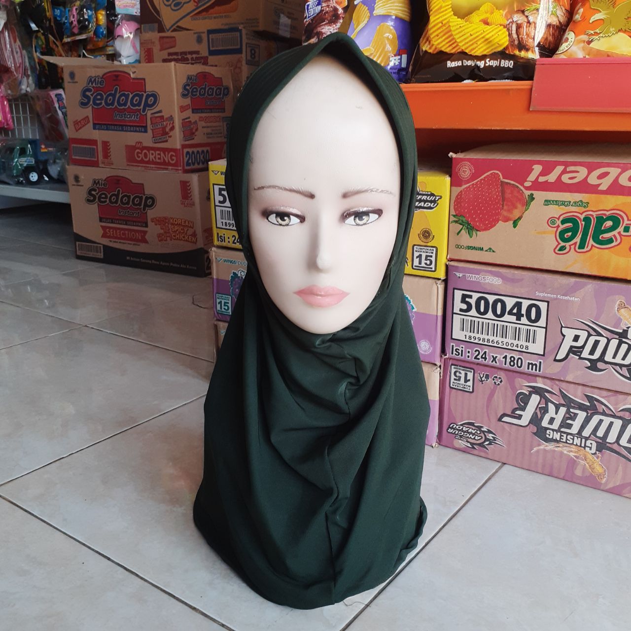 ini adalah Jilbab Sport Army, size: L, material: jersey, color: green army, brand: sportjilbabkalitidu, age_group: all ages, gender: female