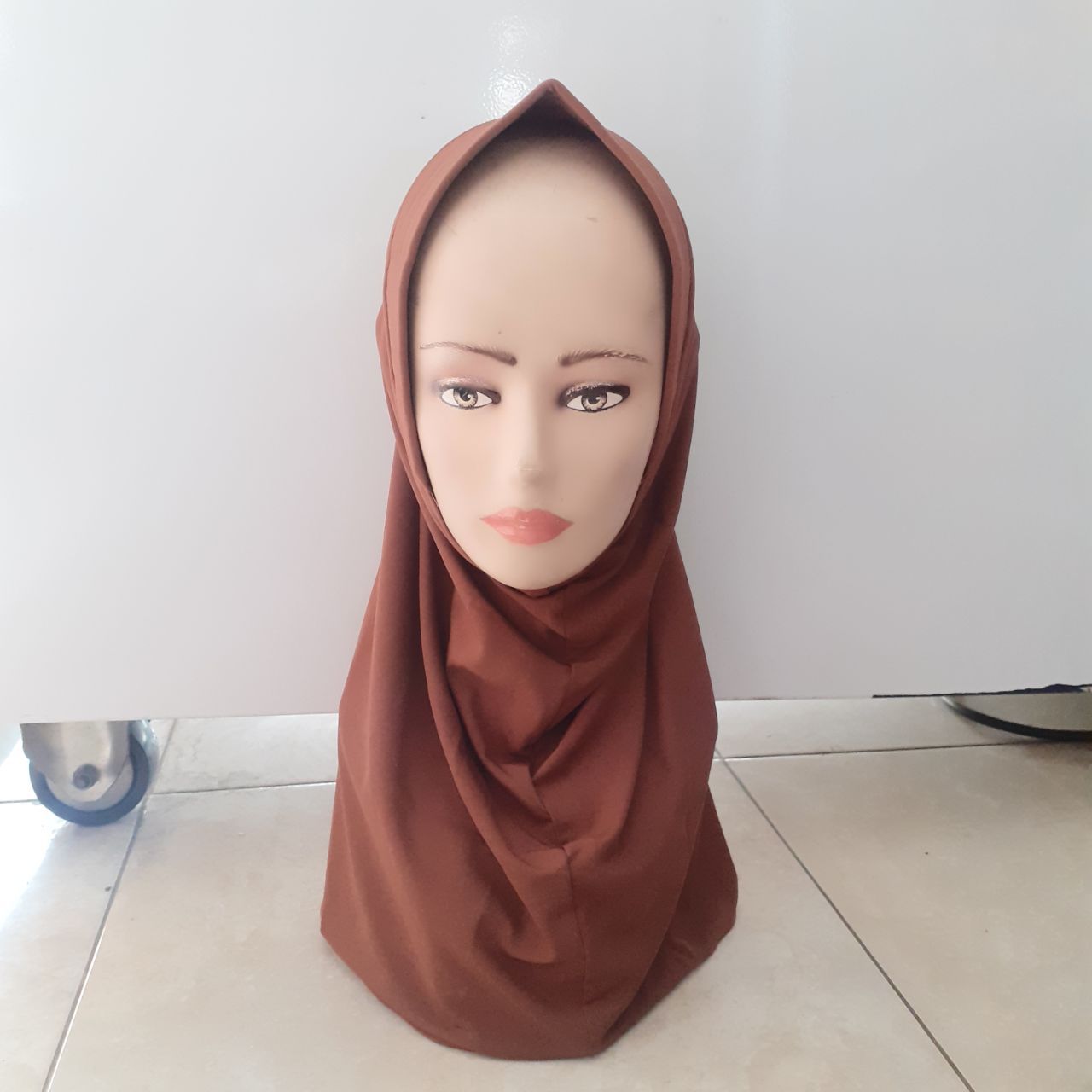 ini adalah Jilbab Sport Mocca, size: L, material: jersey, color: mocca, brand: sportjilbabkalitidu, age_group: all ages, gender: female