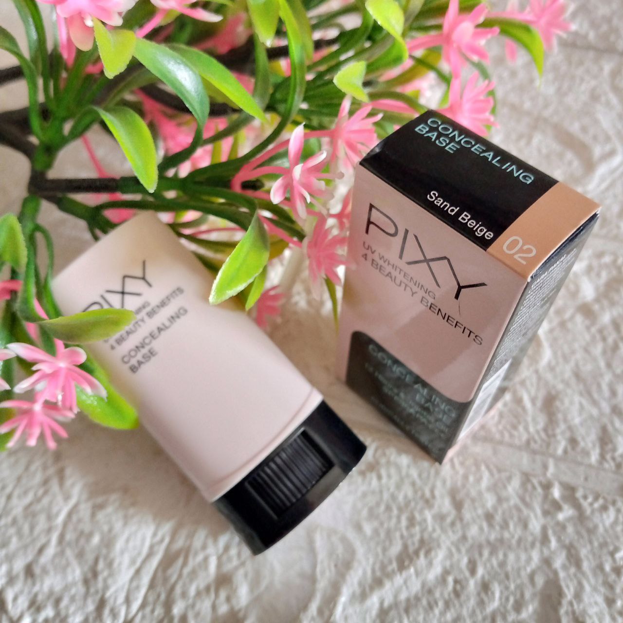 ini adalah Pixy Consealing Base 02 Sand Beige, brand: Pixy, age_group: all ages, gender: female